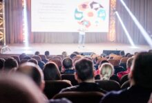 people sitting inside the auditorium